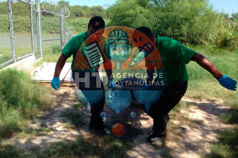 Cad�ver en el r�o Bravo